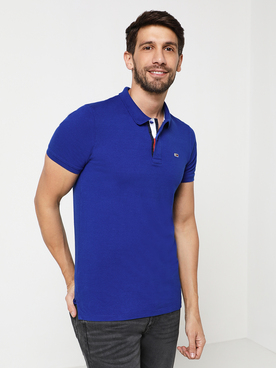 Polo TOMMY JEANS SOLID POLO Bleu